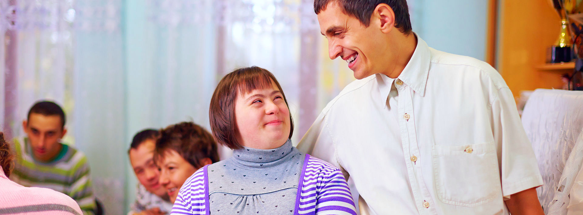 group of happy people with disability in rehabilitation center