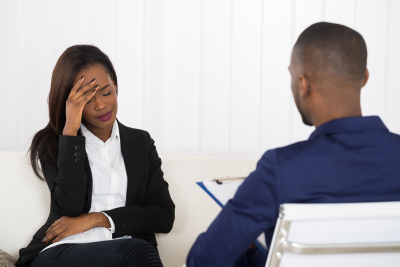 woman talking to a counselor